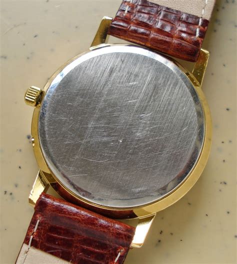 vintage seamaster case back removal